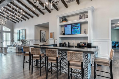 This is a SANDPIPER VILLA featuring large open concept kitchen on Mystic Dunes Resort and Golf Club in Florida - for sale on GolfHomes.com, golf home, golf lot