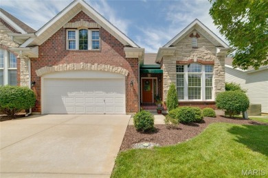 STUNNING 1.5 story villa overlooking the 8th green of on Winghaven Country Club in Missouri - for sale on GolfHomes.com, golf home, golf lot