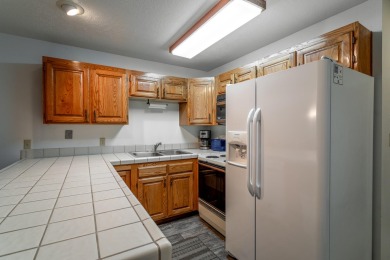 Discover this turnkey condo in Las Palmas, zoned for nightly on Sunbrook Golf Course in Utah - for sale on GolfHomes.com, golf home, golf lot