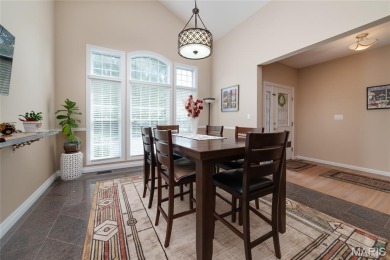 STUNNING 1.5 story villa overlooking the 8th green of on Winghaven Country Club in Missouri - for sale on GolfHomes.com, golf home, golf lot