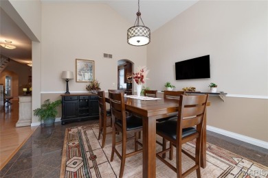 STUNNING 1.5 story villa overlooking the 8th green of on Winghaven Country Club in Missouri - for sale on GolfHomes.com, golf home, golf lot