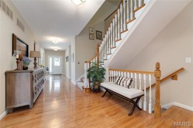 STUNNING 1.5 story villa overlooking the 8th green of on Winghaven Country Club in Missouri - for sale on GolfHomes.com, golf home, golf lot