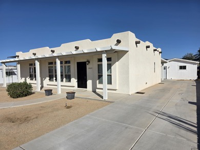 Welcome to your new Santa Fe Style Sanctuary in the Highly on Foothills Executive Golf Course in Arizona - for sale on GolfHomes.com, golf home, golf lot
