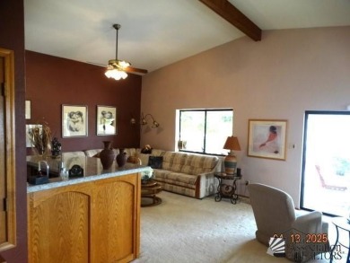 This is a very unique home as it is 2059 sq. ft. with one large on Mesa Del Sol Golf Club in Arizona - for sale on GolfHomes.com, golf home, golf lot