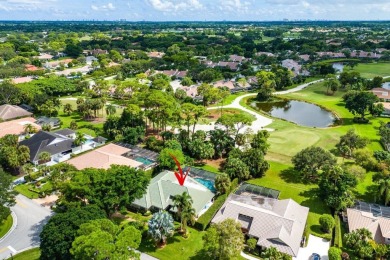 Welcome to your dream oasis at Marlwood Estates in PGA National on PGA National Golf Club in Florida - for sale on GolfHomes.com, golf home, golf lot