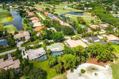 Welcome to your dream oasis at Marlwood Estates in PGA National on PGA National Golf Club in Florida - for sale on GolfHomes.com, golf home, golf lot