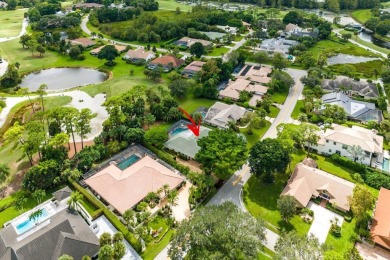 Welcome to your dream oasis at Marlwood Estates in PGA National on PGA National Golf Club in Florida - for sale on GolfHomes.com, golf home, golf lot