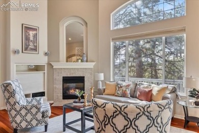 Exquisitely located on the edge of 22 acres of HOA owned forest on The Ridge At Castle Pines North in Colorado - for sale on GolfHomes.com, golf home, golf lot