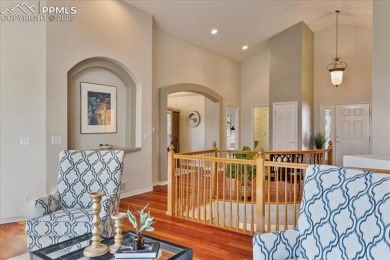 Exquisitely located on the edge of 22 acres of HOA owned forest on The Ridge At Castle Pines North in Colorado - for sale on GolfHomes.com, golf home, golf lot