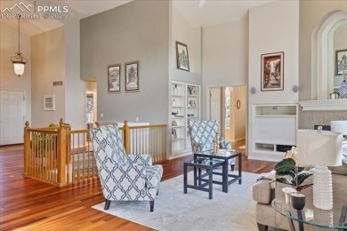 Exquisitely located on the edge of 22 acres of HOA owned forest on The Ridge At Castle Pines North in Colorado - for sale on GolfHomes.com, golf home, golf lot