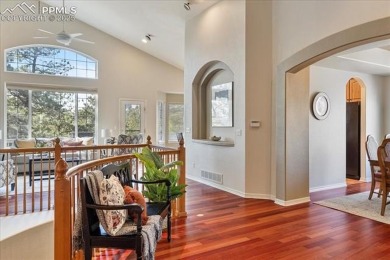 Exquisitely located on the edge of 22 acres of HOA owned forest on The Ridge At Castle Pines North in Colorado - for sale on GolfHomes.com, golf home, golf lot