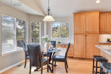 Exquisitely located on the edge of 22 acres of HOA owned forest on The Ridge At Castle Pines North in Colorado - for sale on GolfHomes.com, golf home, golf lot