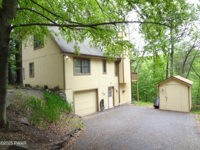 CLASSIC LAKE WALLENPAUPACK PROW FRONT CHALET IN BEAUTIFUL on Paupack Hills Golf and Country Club in Pennsylvania - for sale on GolfHomes.com, golf home, golf lot