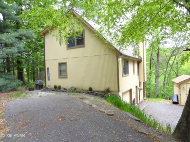 CLASSIC LAKE WALLENPAUPACK PROW FRONT CHALET IN BEAUTIFUL on Paupack Hills Golf and Country Club in Pennsylvania - for sale on GolfHomes.com, golf home, golf lot