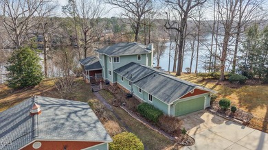Waterfront living at its finest with this gorgeous 4-bedroom on River Golf and Country Club at Lake Royale in North Carolina - for sale on GolfHomes.com, golf home, golf lot