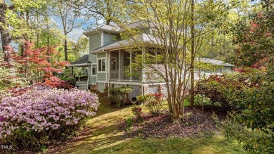 Waterfront living at its finest with this gorgeous 4-bedroom on River Golf and Country Club at Lake Royale in North Carolina - for sale on GolfHomes.com, golf home, golf lot