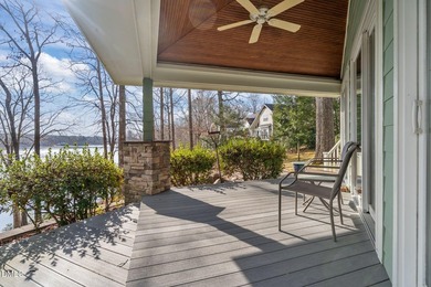 Waterfront living at its finest with this gorgeous 4-bedroom on River Golf and Country Club at Lake Royale in North Carolina - for sale on GolfHomes.com, golf home, golf lot