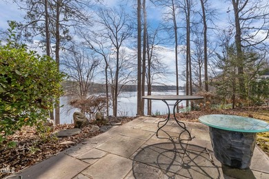Waterfront living at its finest with this gorgeous 4-bedroom on River Golf and Country Club at Lake Royale in North Carolina - for sale on GolfHomes.com, golf home, golf lot