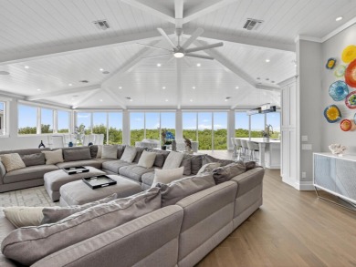 View, view, view! Experience modern luxury in this ''renovated on Hideaway Beach Golf Course in Florida - for sale on GolfHomes.com, golf home, golf lot