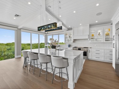 View, view, view! Experience modern luxury in this ''renovated on Hideaway Beach Golf Course in Florida - for sale on GolfHomes.com, golf home, golf lot