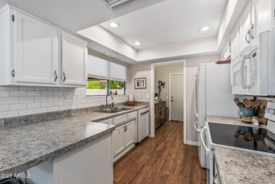 You'll want to live here once you step inside! Woody tile plank on Grandview Golf Course in Arizona - for sale on GolfHomes.com, golf home, golf lot