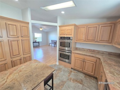 Spacious 2007 Double-Wide  Custom Built Manufactured Home in on Mangrove Bay Golf Course in Florida - for sale on GolfHomes.com, golf home, golf lot