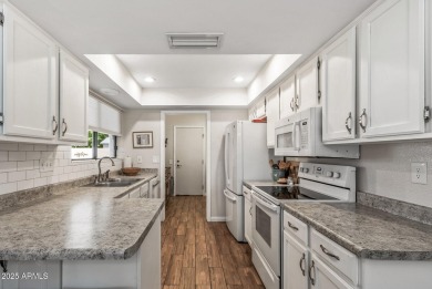 You'll want to live here once you step inside! Woody tile plank on Grandview Golf Course in Arizona - for sale on GolfHomes.com, golf home, golf lot