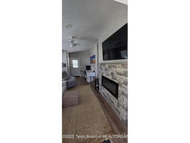 Completely updated park model with a spacious bonus room located on Star Valley RV Golf Course in Wyoming - for sale on GolfHomes.com, golf home, golf lot