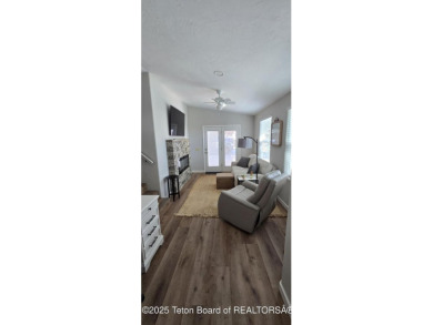 Completely updated park model with a spacious bonus room located on Star Valley RV Golf Course in Wyoming - for sale on GolfHomes.com, golf home, golf lot