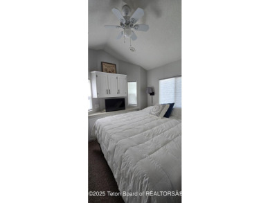 Completely updated park model with a spacious bonus room located on Star Valley RV Golf Course in Wyoming - for sale on GolfHomes.com, golf home, golf lot