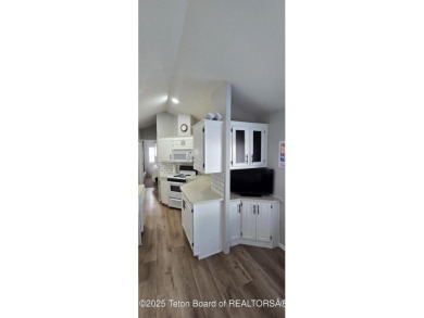 Completely updated park model with a spacious bonus room located on Star Valley RV Golf Course in Wyoming - for sale on GolfHomes.com, golf home, golf lot