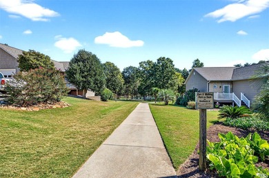 Covered boat slip on deep water! This move-in ready on Stone Creek Cove Golf Course in South Carolina - for sale on GolfHomes.com, golf home, golf lot