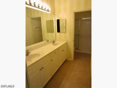 Stunning Second-Floor Condominium with Panoramic Golf Course on Gateway Golf and Country Club in Florida - for sale on GolfHomes.com, golf home, golf lot