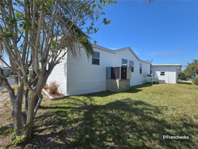 Spacious 2007 Double-Wide  Custom Built Manufactured Home in on Mangrove Bay Golf Course in Florida - for sale on GolfHomes.com, golf home, golf lot