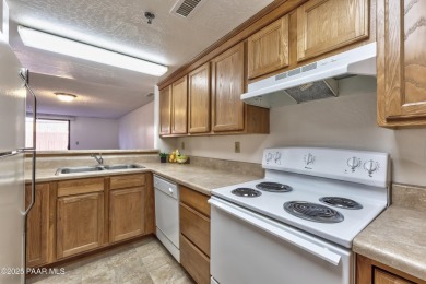 Charming 2-bedroom, 1.5-bath condo located in the desirable on Prescott Golf and Country Club in Arizona - for sale on GolfHomes.com, golf home, golf lot