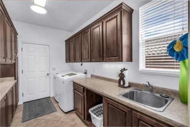 This beautifully maintained Sun River home sits on a desirable on Sunriver Golf Club in Utah - for sale on GolfHomes.com, golf home, golf lot