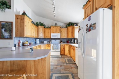 This one-owner residence sits on an oversized 1.12 acre on Star Valley RV Golf Course in Wyoming - for sale on GolfHomes.com, golf home, golf lot