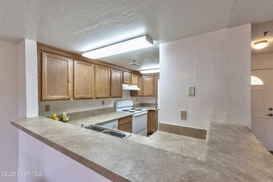 Charming 2-bedroom, 1.5-bath condo located in the desirable on Prescott Golf and Country Club in Arizona - for sale on GolfHomes.com, golf home, golf lot