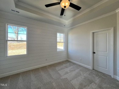 Don't miss this beautiful new ranch home in Clayton's Ashcroft on Riverwood Golf and Athletic Club in North Carolina - for sale on GolfHomes.com, golf home, golf lot