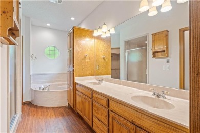 With the Highlands Golf Course in the backyard, nationally on Bella Vista Country Club - Highlands in Arkansas - for sale on GolfHomes.com, golf home, golf lot