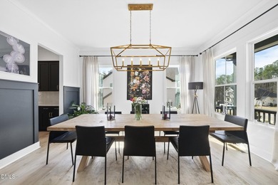 Tucked away on a quiet cul-de-sac in the prestigious Hasentree on Hasentree Club in North Carolina - for sale on GolfHomes.com, golf home, golf lot