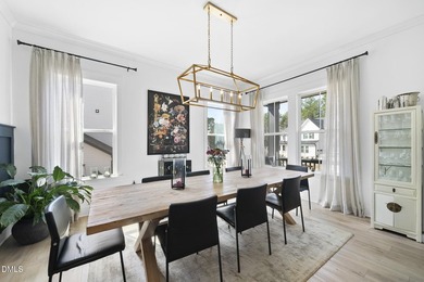 Tucked away on a quiet cul-de-sac in the prestigious Hasentree on Hasentree Club in North Carolina - for sale on GolfHomes.com, golf home, golf lot