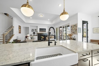 Tucked away on a quiet cul-de-sac in the prestigious Hasentree on Hasentree Club in North Carolina - for sale on GolfHomes.com, golf home, golf lot