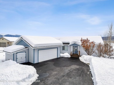 This one-owner residence sits on an oversized 1.12 acre on Star Valley RV Golf Course in Wyoming - for sale on GolfHomes.com, golf home, golf lot