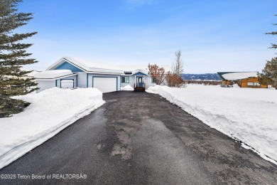 This one-owner residence sits on an oversized 1.12 acre on Star Valley RV Golf Course in Wyoming - for sale on GolfHomes.com, golf home, golf lot