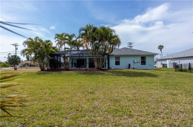 Welcome to this fabulous salt water pool home with a tranquil on Burnt Store Golf Club in Florida - for sale on GolfHomes.com, golf home, golf lot