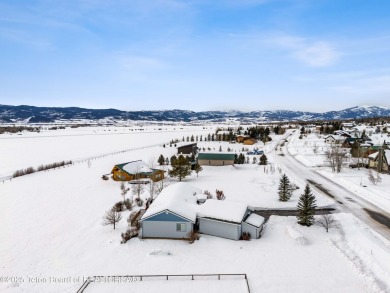 This one-owner residence sits on an oversized 1.12 acre on Star Valley RV Golf Course in Wyoming - for sale on GolfHomes.com, golf home, golf lot