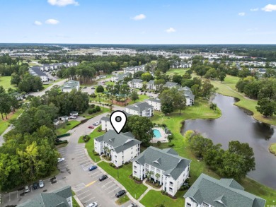 This captivating 3rd floor end unit features 2 bedrooms and 2 on  in South Carolina - for sale on GolfHomes.com, golf home, golf lot