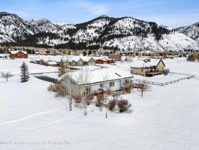 This one-owner residence sits on an oversized 1.12 acre on Star Valley RV Golf Course in Wyoming - for sale on GolfHomes.com, golf home, golf lot