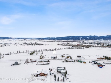 This one-owner residence sits on an oversized 1.12 acre on Star Valley RV Golf Course in Wyoming - for sale on GolfHomes.com, golf home, golf lot